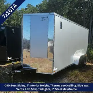 Enclosed silver cargo trailer on grass; 7 ft interior height, ThermaCool ceiling, side vents, LED taillights, 6-in steel mainframe.