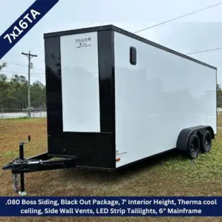 Box cargo trailer on a grassy lot with black front panel; features listed: .080 Boss Siding, Black Out Package, 7' interior height, LED taillights, and tandem axles.