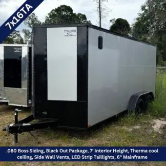 Enclosed cargo trailer on a gravel lot, black nose and gray sides, tow hitch visible; banner notes 7' interior height and LED taillights.