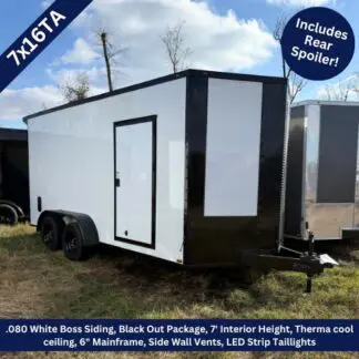 Enclosed white trailer with black trim and dual axles, side entry door, diamond-plate front, and black tongue hitch; likely a 7x16TA model with rear spoiler.