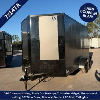 Black enclosed cargo trailer with charcoal siding and dual axles; features include barn doors in rear, black-out package, 7' interior height, side door, vents, and LED taillights (model 7x14TA).