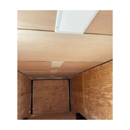 The inside of an enclosed Raw Luan on Ceiling cargo trailer.