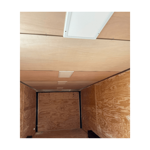 The inside of an enclosed Raw Luan on Ceiling cargo trailer.