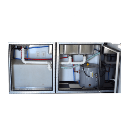 A refrigerator with pipes and hoses in it.