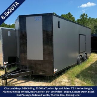Charcoal-gray 8.5x20TA cargo trailer with dual axles, diamond-plate front, side entry door, and extended tongue (informative product image).