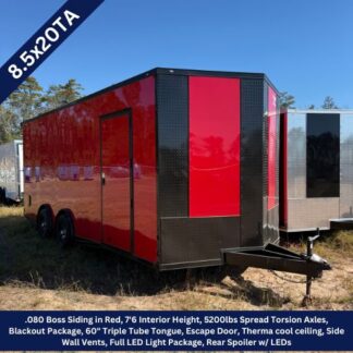 Red enclosed cargo trailer with black diamond-plate front, side door, dual axles, parked on grass under a clear blue sky (8.5x20TA).