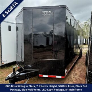 Black enclosed cargo trailer with diamond-plate sides, dual axles, and a front hitch, parked outdoors; labeled Titanium Cargo Trailers LLC and '8.5x28TA' in the corner.
