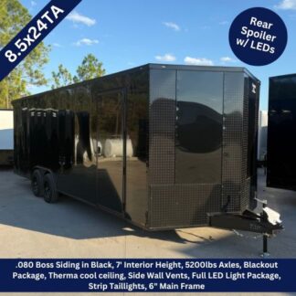 Black enclosed cargo trailer with tandem axles and a diamond-plate front; features include 8.5x24TA, 7' interior height, blackout package, Therma cool ceiling, side wall vents, full LED lighting, strip taillights, 6" main frame, and a rear spoiler with LEDs